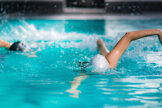 envato-women-swimming-together-in-indoor-swimming-pool-imp